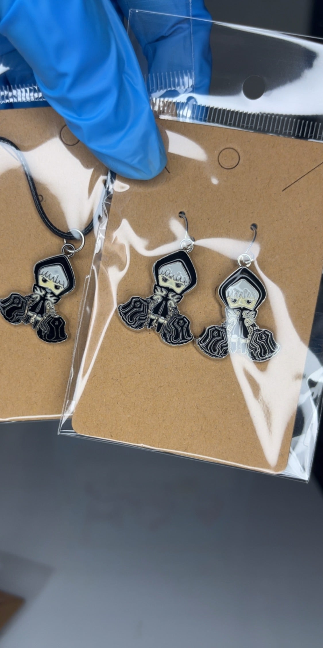 Black Rock Shooter Strength Charm Jewelry